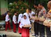 Dukung Generasi Cerdas, Polres Pacitan Bagikan Makanan Bergizi Gratis untuk Pelajar Sekolah Dasar