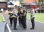 Asistensi Kampung Tangguh dan Polisi RW, Kapolda Jatim Pimpin Apel Besar Petugas Polmas dan Satkamling Pasca Pilkada