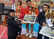 Ketua Umum PSHT Pusat Madiun Tutup dan Serahkan  Tropi Kejurprov Pencak Silat Jawa Timur 2025