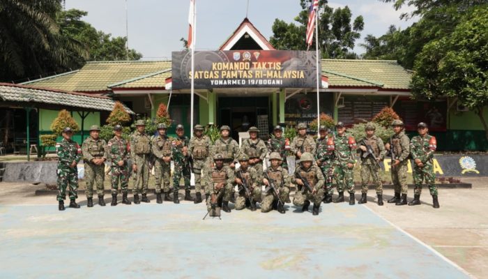 Satgas Pamtas RI-Malaysia Yonarmes 19/Bogani Terima Kunjungan Pegawai Memerintah Batalion Ketiga Rejimen Renjer Diraja Malaysia