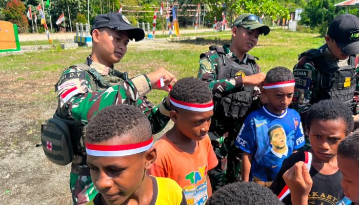 Kemeriahan Peringatan Hari Kemerdekaan Republik Indonesia, Satgas Swasembada Yonif 643/Wns Koops TNI Habema Gelar Perlombaan Bersama Masyarakat