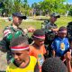 Kemeriahan Peringatan Hari Kemerdekaan Republik Indonesia, Satgas Swasembada Yonif 643/Wns Koops TNI Habema Gelar Perlombaan Bersama Masyarakat