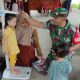 Cegah Stunting Sejak Dini, Babinsa Koramil 0808/03 Kanigoro Turun Tangan Dampingi Kegiatan Posyandu Di Desa Bangle